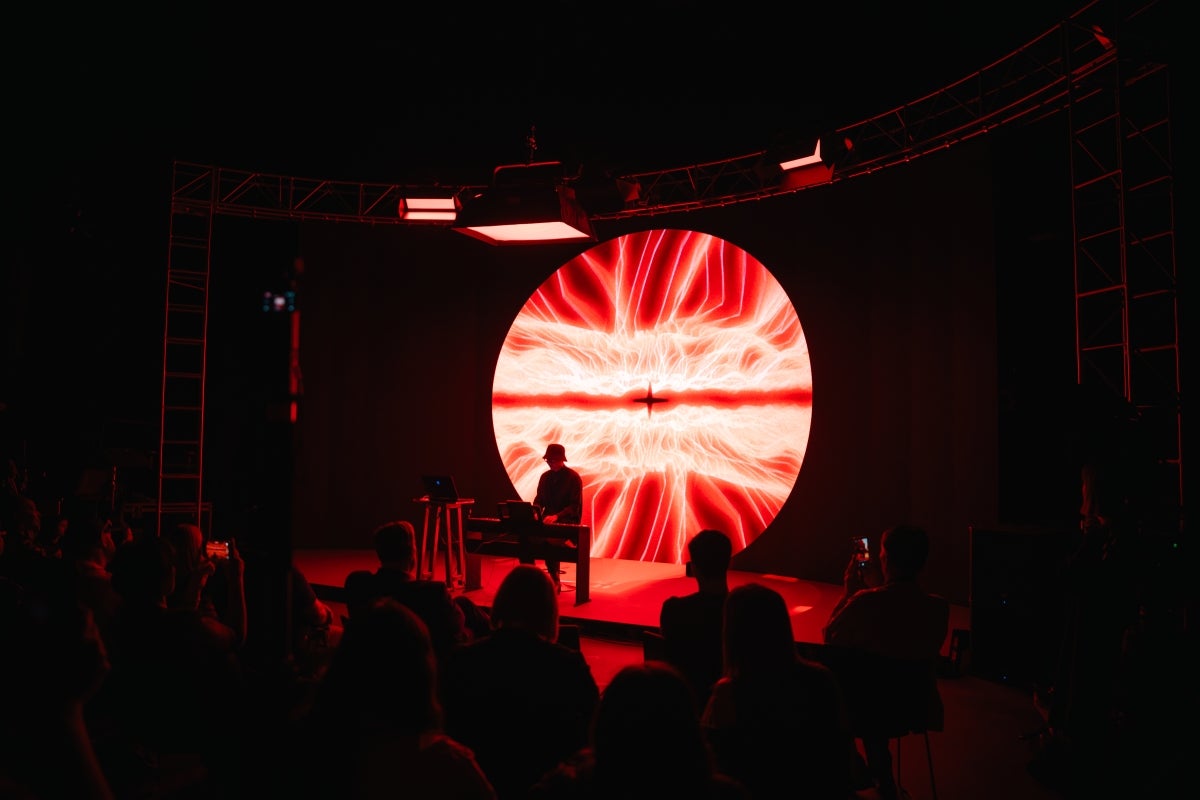 Graduate student Jialong Xu showcases “Polaris” to guests.